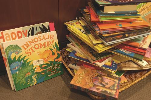 The English department held a book drive in the Barker Center to collect childrens’ books. Books were piled high yesterday on the second to last day of classes.