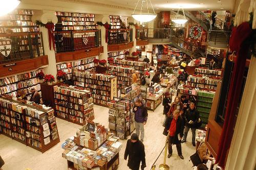 With five days left until Christmas, holiday shoppers browse the Coop yesterday looking for gifts among crowded bookshelves topped with festive decorations such as poinsettias and wreathes.