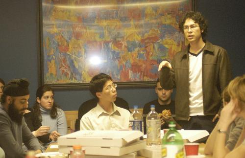 Alexander S. Wong ’08, standing, talks about President Lawrence H. Summers’ recent remarks on women and science yesterday at a debate sponsored by the Harvard Political Union. Over 70 undergraduates discussed Summers’s comments at the IOP. 