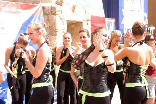 The Crimson Dance Team applauds their competitors as they learn they've been knocked out of the first place spot.