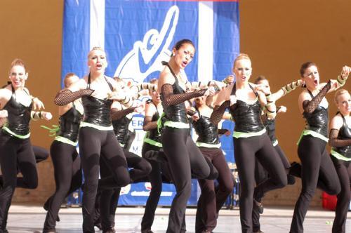 The dance teams yells a spirited "HU!" during the funk portion of their routine.