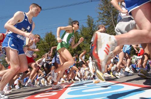 Runners make their way across the start line during the 109th Boston Marathon yesterday in Hopkinton, Mass. Ethiopia’s Hailu Negussie won the men’s division, going from Hopkinton to the finish line at Boston’s Back Bay in 2:11:45.