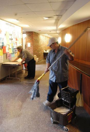 Jeffrey Moura, a custodial worker at the Graduate School of Education, is involved in a campaign to win health benefits for janitors.