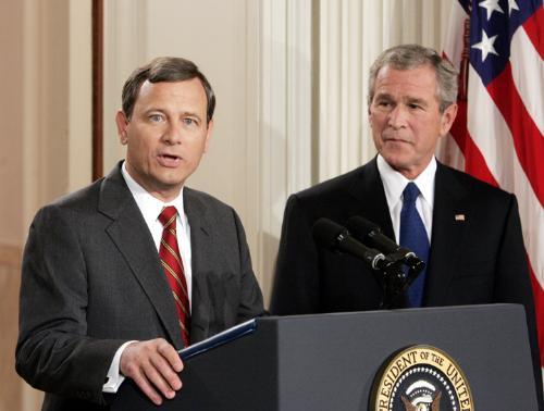 John G. Roberts Jr. ’76 speaks at the White House announcement of his nomination to the Supreme Court on Tuesday night as President George W. Bush looks on. Roberts next faces Senate confirmation hearings. 