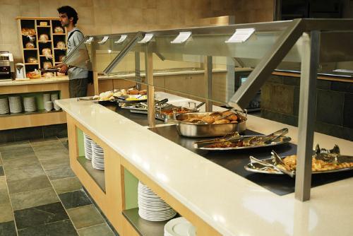 Students ate in the spiffed-up Mather House dining hall yesterday as it reopened after summer renovations. The Dunster House dining hall was renovated as well, along with the kitchen shared by the two Houses.