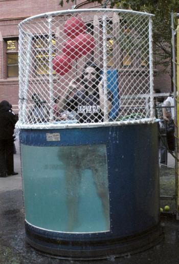 Undergraduate Council President Matthew J. Glazer ’06 plunges into the dunk tank.
