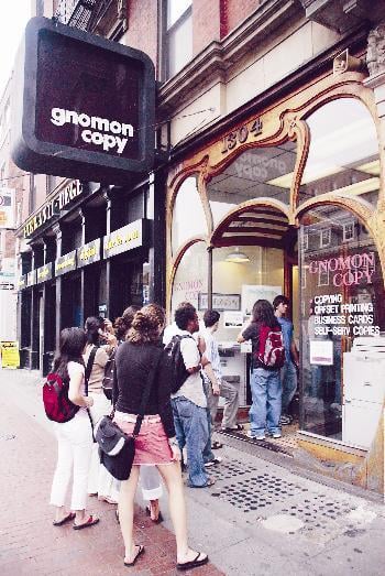 Students stand in line for coursepacks outside of Gnomon Copy on Mass. Ave. Many complained of the long waits and the unavailability of some coursepacks.