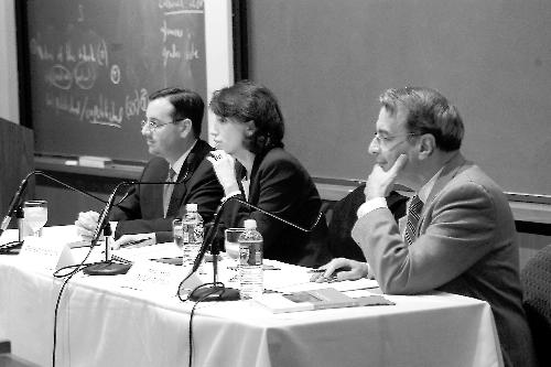  Lawyers Bradford Berenson, Deborah Pearlstein, and Professor Philip B. Heyman debate in a forum on the role of executive power in the "War on Terror" at the Law School yesterday.