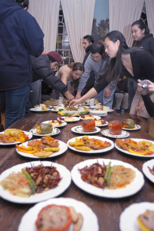 Participants in The Harvard-Radcliffe Chinese Students Association’s Iron Chef Competition garnish their dishes Saturday night in the Lowell House JCR.