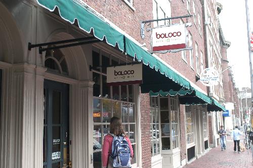Signs on Mount Auburn Street proclaim the new name of the eatery formerly known as The Wrap. The new sobriquet, Boloco, is designed to more accurately reflect the restaurant’s menu. 