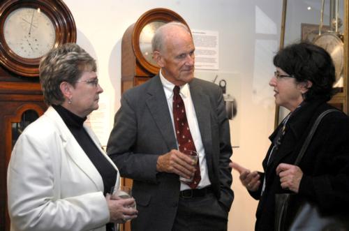 Judith Lajoie; George Putnam, whose family helped fund the display; and
gallery architect Andrea Leers celebrate the debut of the Putnam
Gallery yesterday in the Science Center. The new gallery will house a
collection of historical scientific instrumen