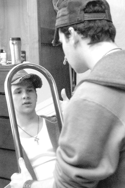 Intent on pop superstardom, Shields  practices his Narcissus impression.