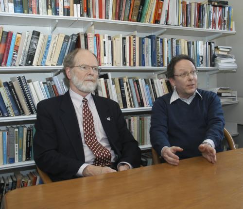 Professors James J. McCarthy (left) and Andrew D. Gordon '74&nbsp;discuss Summers’ resignation yesterday in Gordon’s Robinson Hall office. <br>