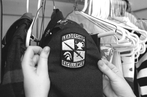 Military and civilian clothes share space in Waterman's closet, as well as in her daily life.