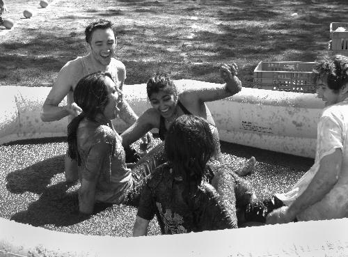 Students frolick in the lime-flavored slime at a CLC organized Jell-O wrestling event in the MAC quad Saturday. 
