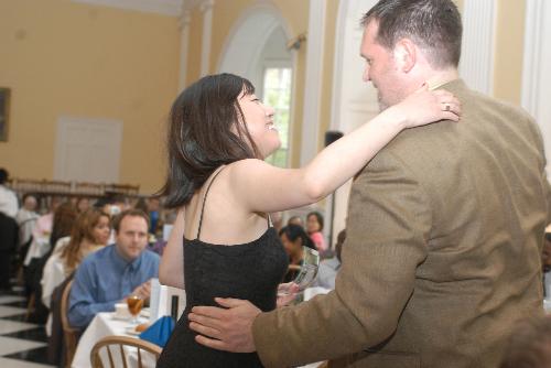 HeeWon Lee, winner of the Stride Rite Post-Graduate Fellowship award, hugs Tim McCarthy at PBHA’s 5th Annual Celebration of Public Service on Monday.