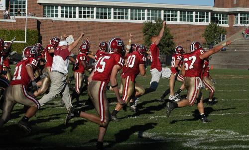 After Matt Schindel hit the game-winning field goal against Brown, the rest of the Crimson rushed the field in celebration of the comeback win.