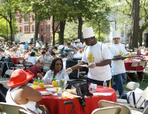Cantabridgian senior citizens enjoy dessert on Wednesday at the annual Harvard Yard Picnic, “Cambridge Con Salsa.”