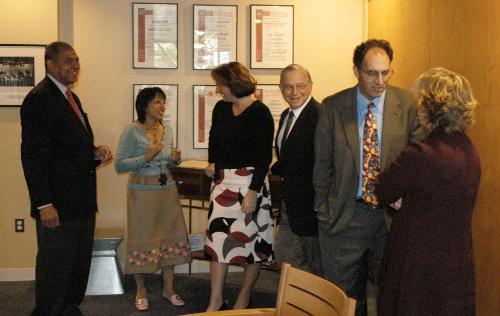 George E. Moose, Kishwer Falkner, Christina Martin, James F. Flug, Alan A. Khazei, and Karen Hicks (from left to right) gathered in the Institute of Politics (IOP) yestreday afternoon. The six IOP fellows will lead study groups in the fall.