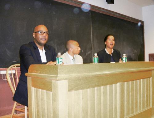 Cambridge Mayor Kenneth E. Reeves ’72 and Gerard McGeary ’04 took part
in the “Politics and the New Millenium” discussion Saturday. (Courtesy
Kimberly Levy)<br>
