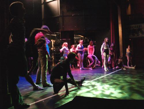 Kevin Barlowski, a sophomore at Emerson College, looks on as the cast of “A Chorus Line” rehearses. 