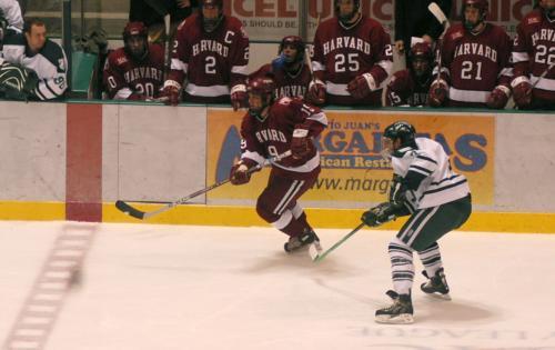 Sophomore Steve Rolecek (No. 19) evades a Dartmouth defender, but the Crimson couldn't escape the Big Green Machine Friday night. Harvard fell 5-2 in its season opener.