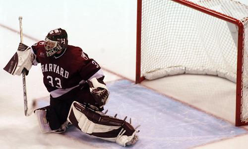 Senior goaltender Justin Tobe—shown here in earlier action—made 24 saves, including three in overtime. But Vermont forward Dean Strong was able to slip the puck into the net late in the extra frame.