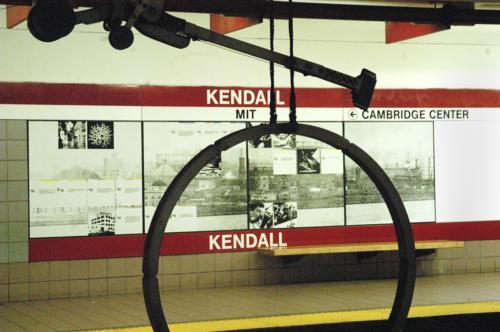 A member of the Kendall Band, a series of bells and mallets, in the MBTA Kendall Square stop. These bells, which can be played by commuters, were installed 22 years ago and demonstrate theories taught in introductory physics.