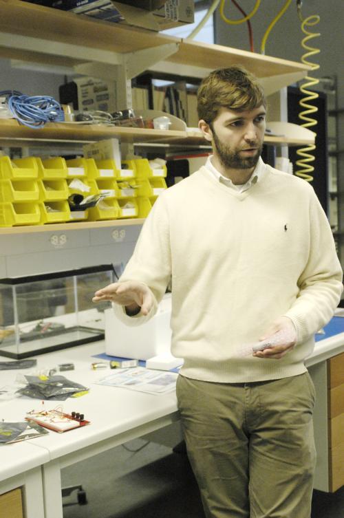 Robert J. Wood, Associate Professor in the Engineering and Applied Sciences Department, shows off his Micro Air Vehicles that mimic insect motion.