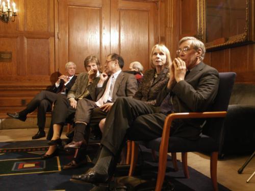 Corporation members and overseers await Faust’s appearance. “Every time we see her speak,” Overseer William F. Lee ’72 said, “I feel better and better.”