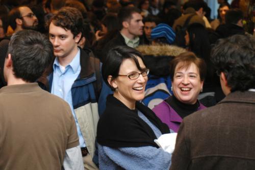 Law School Dean Elena Kagan, right, shares a laugh with students and faculty at a celebration in her honor yesterday in Harkness Commons.