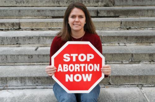 Meghan E. Grizzle '07 with her true baby: Pro-Life activism.