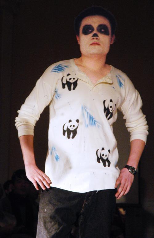 Ren Zhao '08 models at Identities, a fashion show aimed at exploring Asian American culture, in Lowell Dining Hall Saturday evening.
