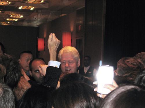 Former President Bill Clinton is surrounded by Harvard students and professors at the Charles Hotel on Friday, following a speech in which he called for a renewed commitment to nonproliferation.