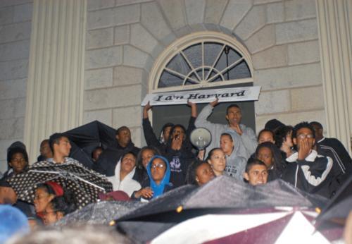Students stand against racism and for better diversity education Wednesday at the “My Skin Belongs at Harvard” event sponsored by the Black Men’s Forum and the Association of Black Harvard Women.