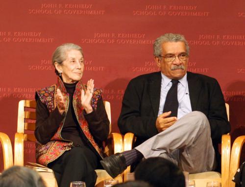 Derek Walcott, right, seated next to Nadine Gordimer at a recent event at the Kennedy School. He was accused of sexual harassment in 1982.
