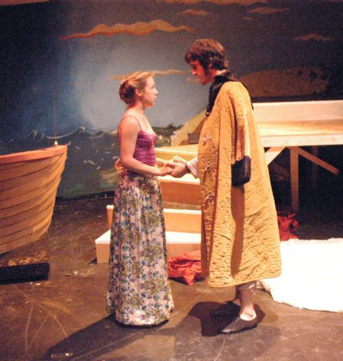 Adam (Samson Kohansky) and Isobel, his bride, (Cailin O’Connor ‘05) discuss his insensible quest for Gildoray.