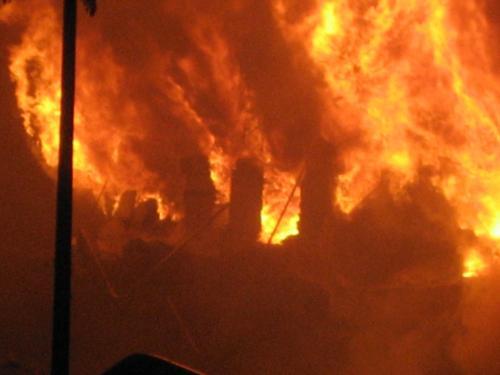 A Transportes Aéreos Marília (TAM) warehouse in São Paulo blazes after a TAM Airbus 320 crashed into it. 
