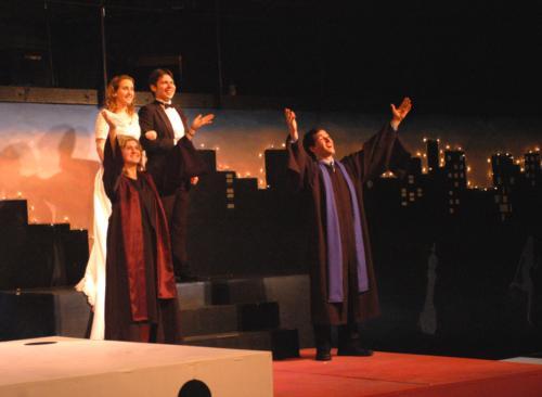 Celebrants (Morgan L. Mallory ’10 and Walter B. Klyce III ’10) perform a wedding ceremony at the end of Act I for a hesitant bride (Christine K. L. Bendorf ’10) and groom (Jonas A. Budris ’06).  