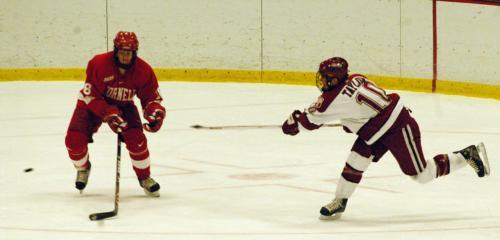 Co-captain Mike Taylor, shown here in Friday’s game against Cornell, and sophomore center Doug Rogers launched point-blank shots on net in the closing seconds of Saturday’s contest against Colgate, but Raiders goaltender Mark Dekanich was able to hold on 
