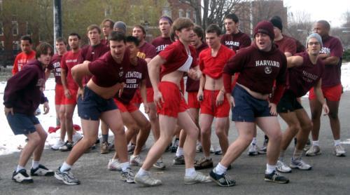 New members of the Fox Club perform a sequence from the cheerleading film, "Bring It On," by the Science Center yesterday morning.