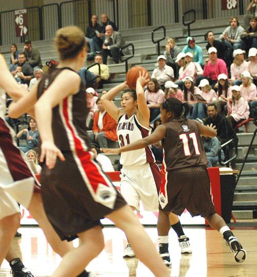 Junior guard Emily Tay brought more than just scoring to the floor this weekend, adding acrobatic behind-the-back passes to her game, while leading the Crimson to two all-important Ancient Eight victories.