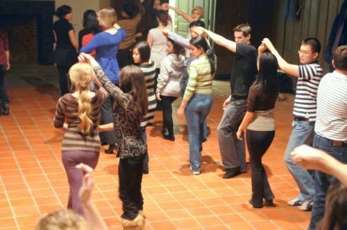 The Ballroom Dance Team took to the dance floor in the Old Leverett Library last night. New members then joined in, swaying their hips to the sounds of Latin medleys.