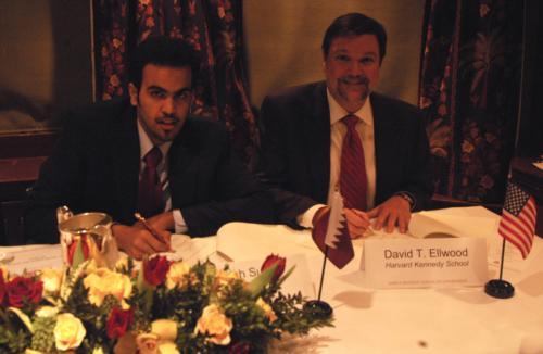 Sheikh Sultan signs the terms of agreement for a $2 million gift with Dean David T. Ellwood of the Kennedy School of Government last night at the Faculty Club, establishing a fellowship fund.