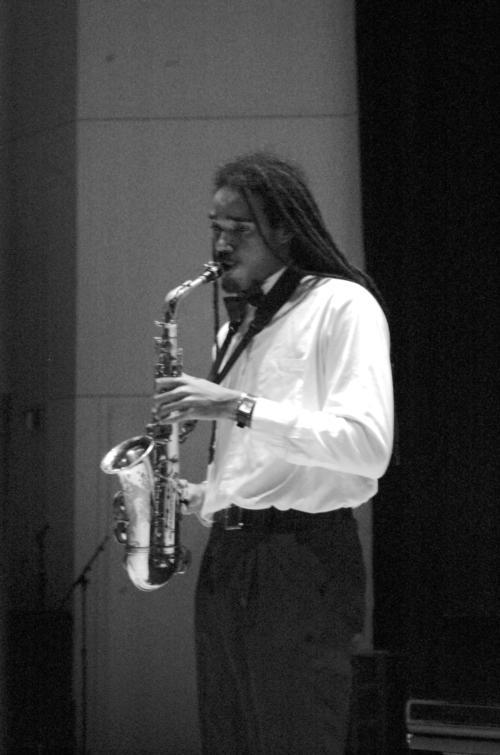 Marcus G. Miller ‘08 perfomed at Evening of Fine Arts, an event held by the Harvard Black Men’s Forum in Lowell Lecture Hall on Friday evening.