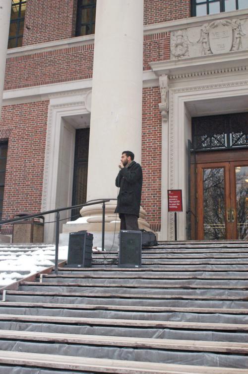 Mujeeb Khan, a student at the Graduate School of Arts and Sciences, performs a call to prayer on the steps of Widener Library yesterday afternoon as part of Islamic Awareness Week.