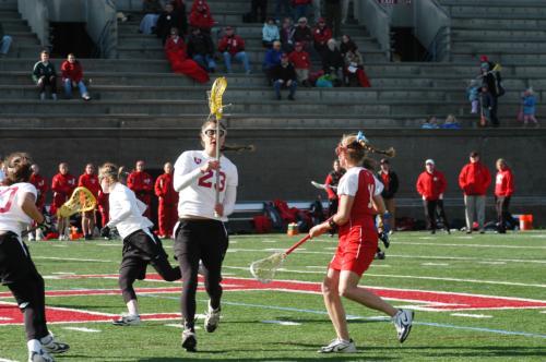 Senior Caroline Simmons led the Harvard women’s lacrosse team with two points in its game with Boston University yesterday, but the Terriers easily routed the Crismon, dealing Harvard an 18-6 loss.