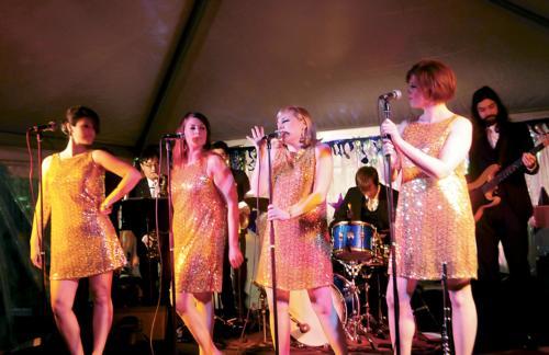 The Sweet Divines, a 12 piece soul revival band, performed during the Bookish Ball in Holyoke Center on Friday afternoon.