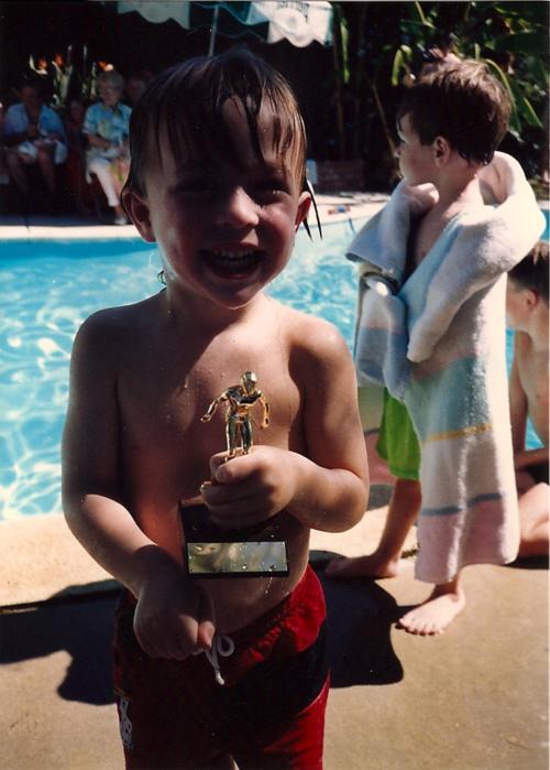 Don't be fooled by the floppy ears and the high-tech Speedo skinsuit, this is no baby Phelps.