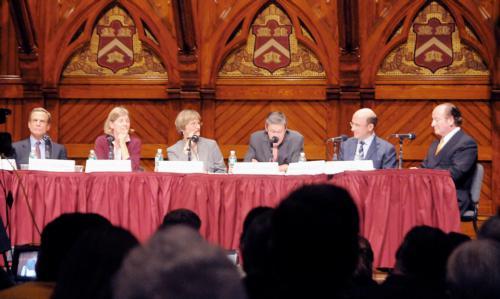 University President Drew G. Faust moderates a panel discussion yesterday with academic luminaries on the ongoing finanical crisis in Sanders Theatre.